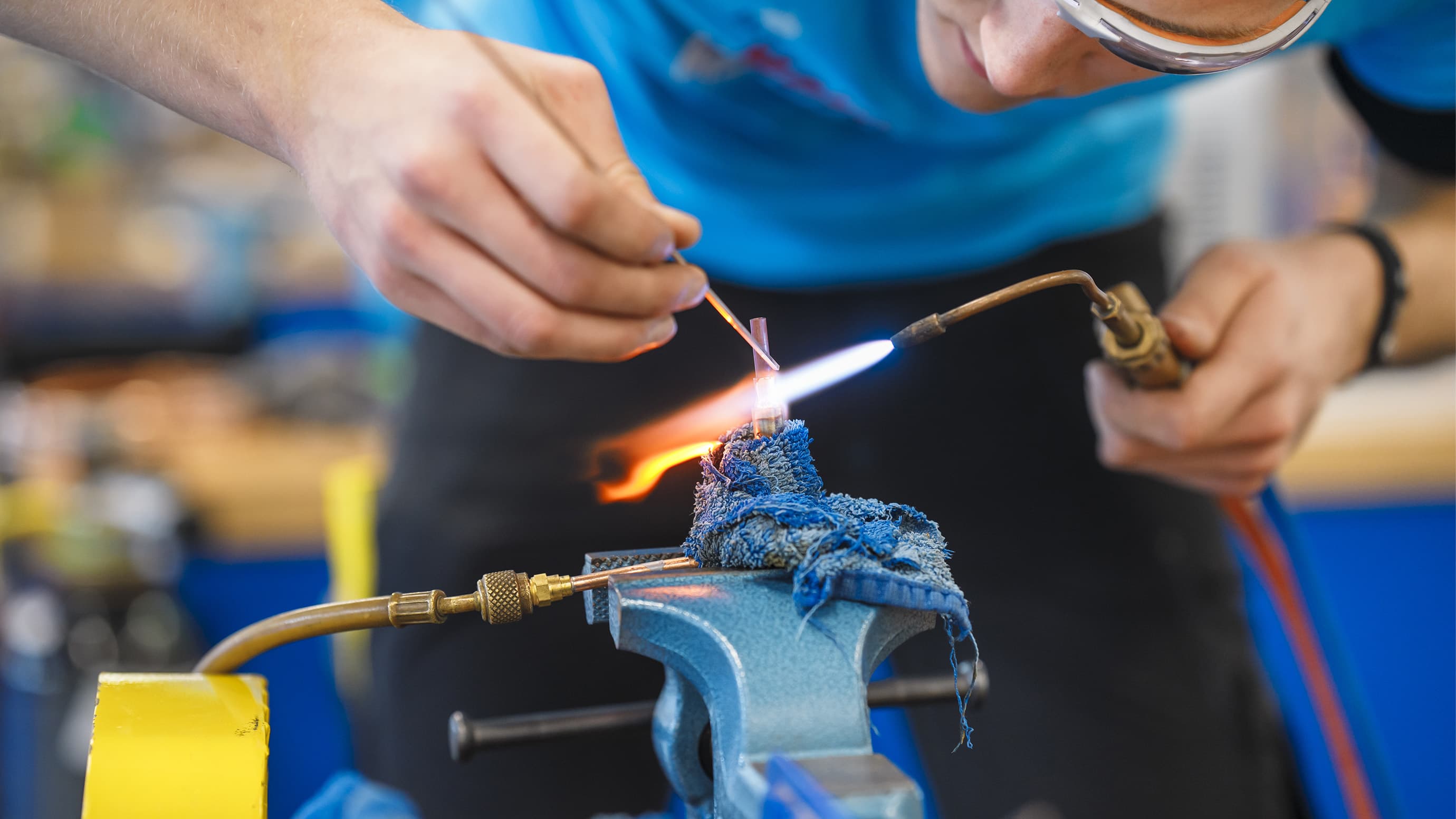 A male participant of the German Craft Skills in Refrigeration Plant Assemblers is welding